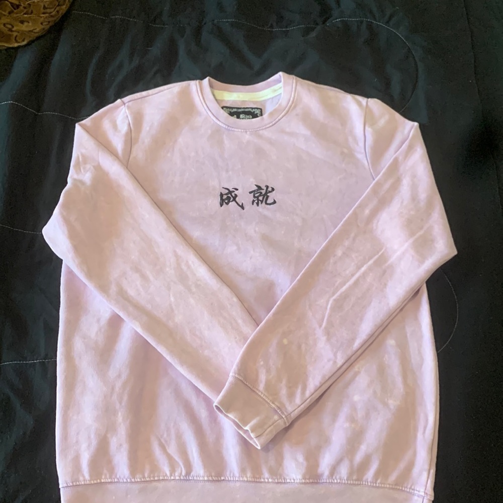 Never worn or washed.